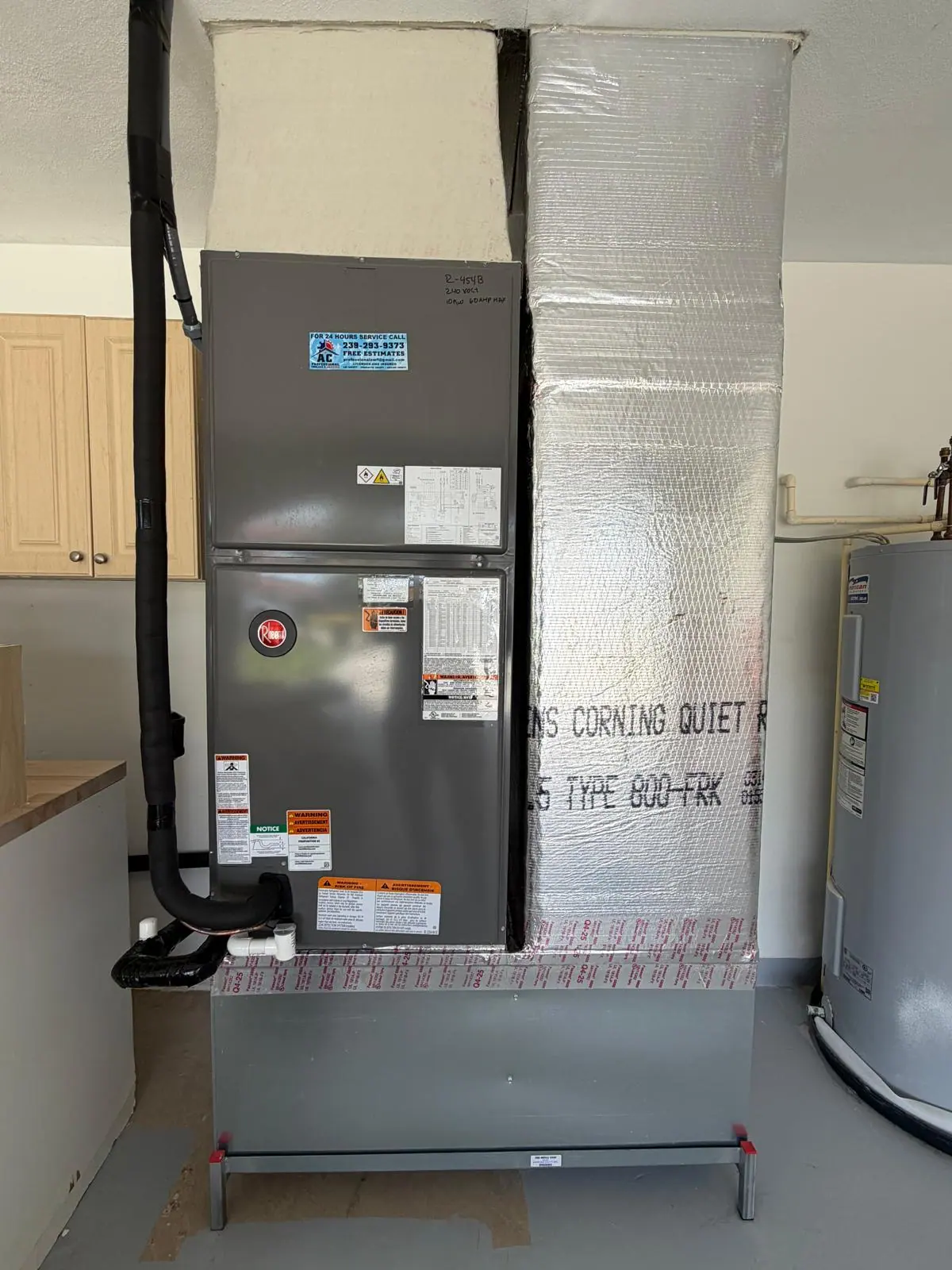 Air handler installed with sealed ductwork in a garage