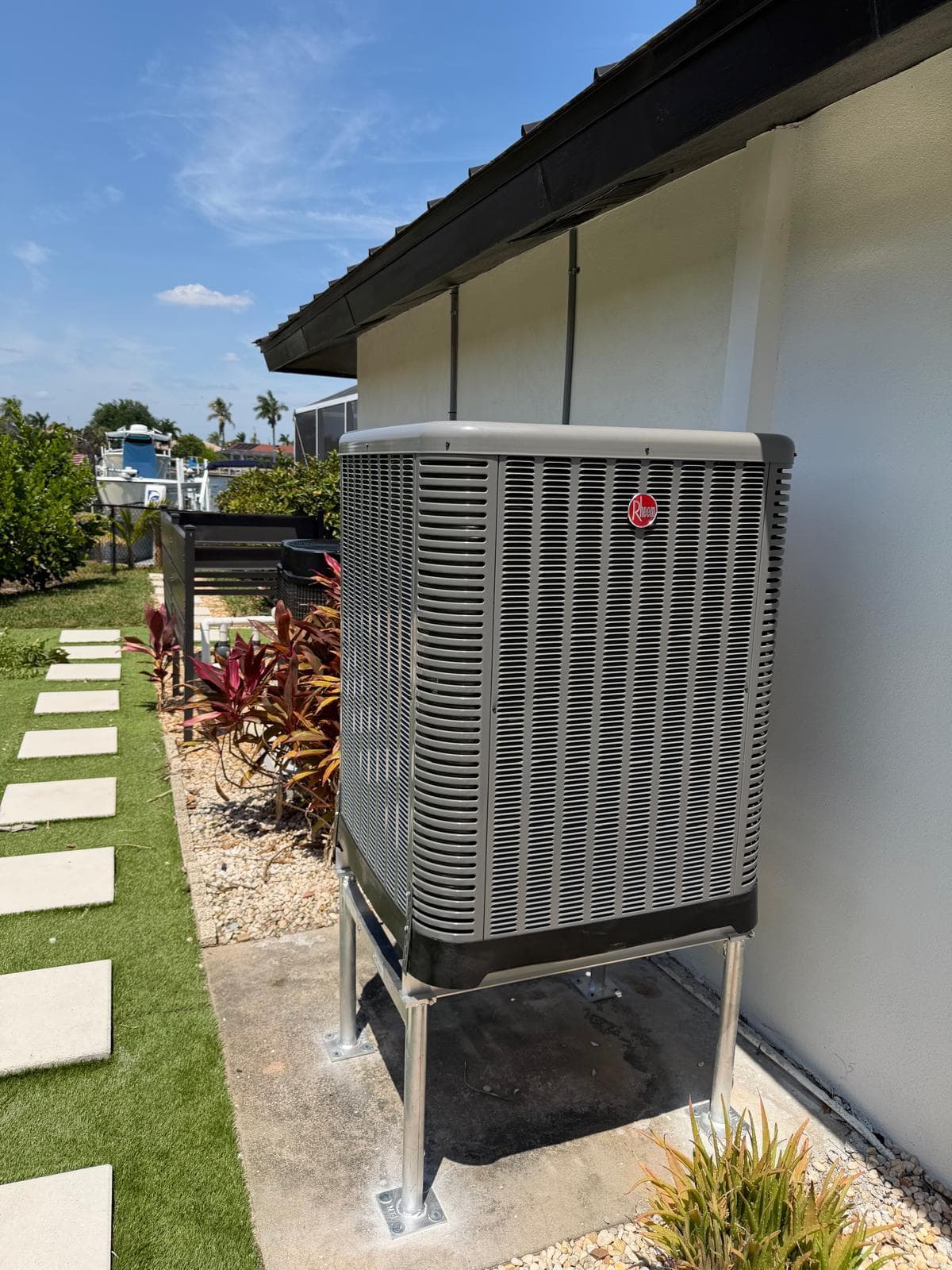 Rheem outdoor AC system installed by AC Professional in Southwest Florida
